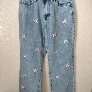 Chic Light Blue Jeans with Pink Bow Accents